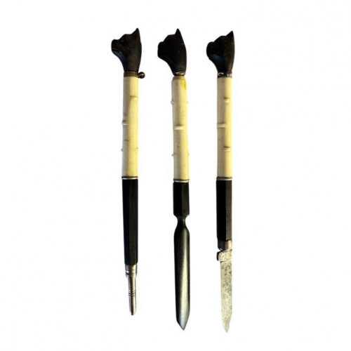 Set of three pug head writing tools