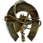 Silver gilt equine brooch