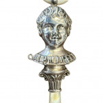 A Victorian silver and mother of pearl child's rattle and teething ring.