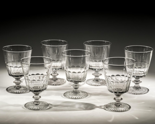 A SET OF SEVEN BUCKET BOWL GOBLETS