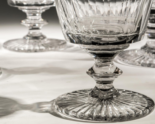 A SET OF SEVEN BUCKET BOWL GOBLETS