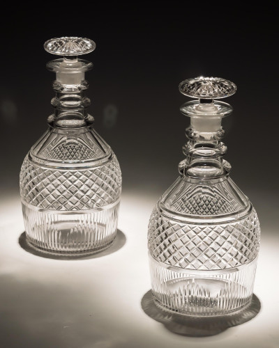 A PAIR OF STRAWBERRY DIAMOND CUT DECANTERS