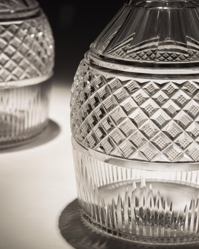 A PAIR OF STRAWBERRY DIAMOND CUT DECANTERS
