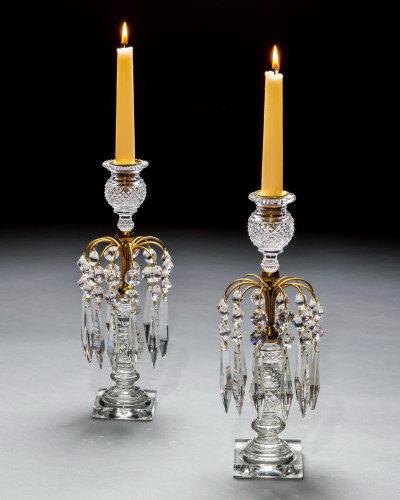A PAIR OF ELEGANT DIAMOND CUT REGENCY CANDLESTICKS