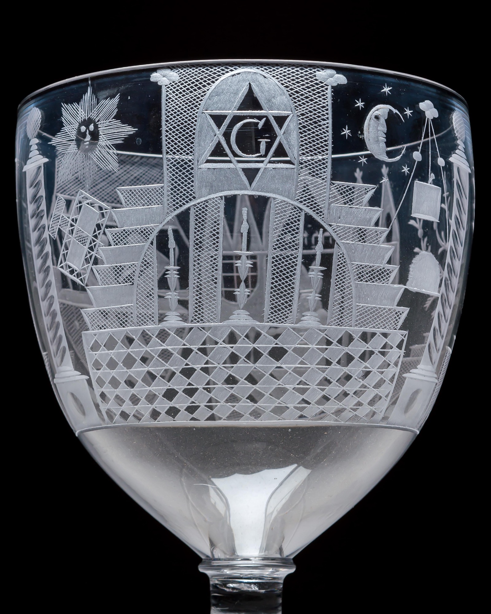 AN ENGRAVED GLASS SERVICE OF MASONIC INTEREST ALONG WITH A COLLECTION OF CORRESPONDING MASONIC REGALIA