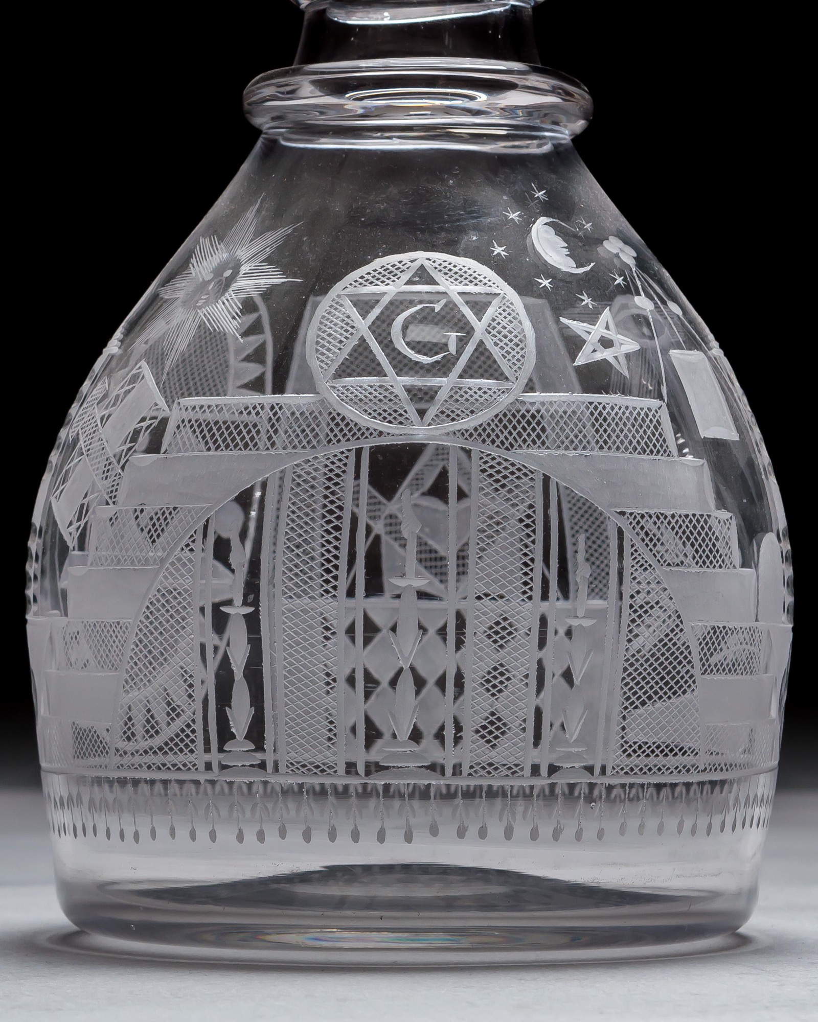 AN ENGRAVED GLASS SERVICE OF MASONIC INTEREST ALONG WITH A COLLECTION OF CORRESPONDING MASONIC REGALIA