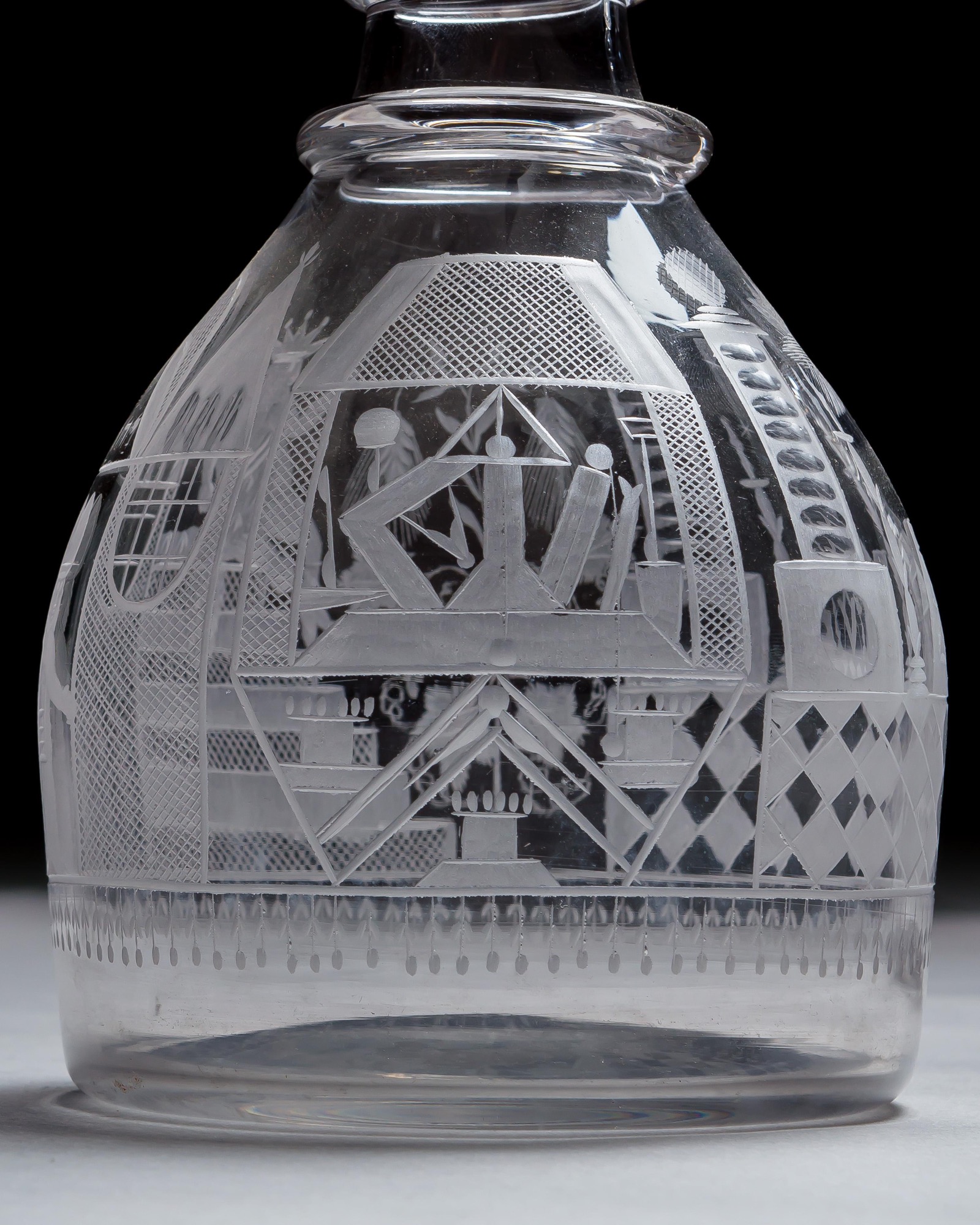 AN ENGRAVED GLASS SERVICE OF MASONIC INTEREST ALONG WITH A COLLECTION OF CORRESPONDING MASONIC REGALIA