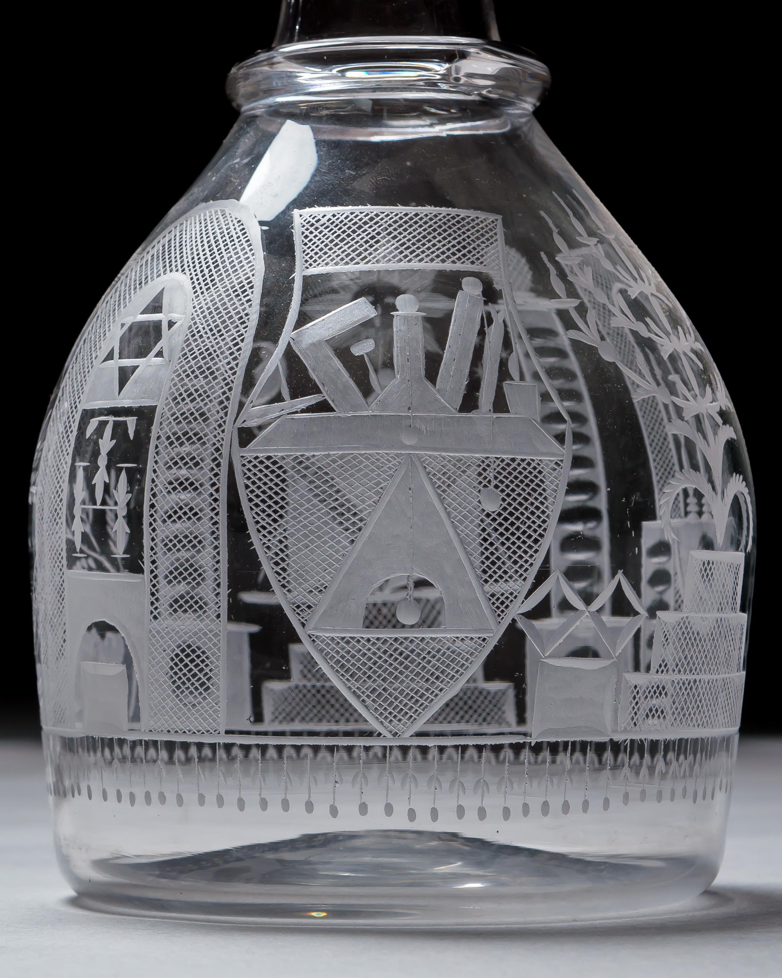 AN ENGRAVED GLASS SERVICE OF MASONIC INTEREST ALONG WITH A COLLECTION OF CORRESPONDING MASONIC REGALIA