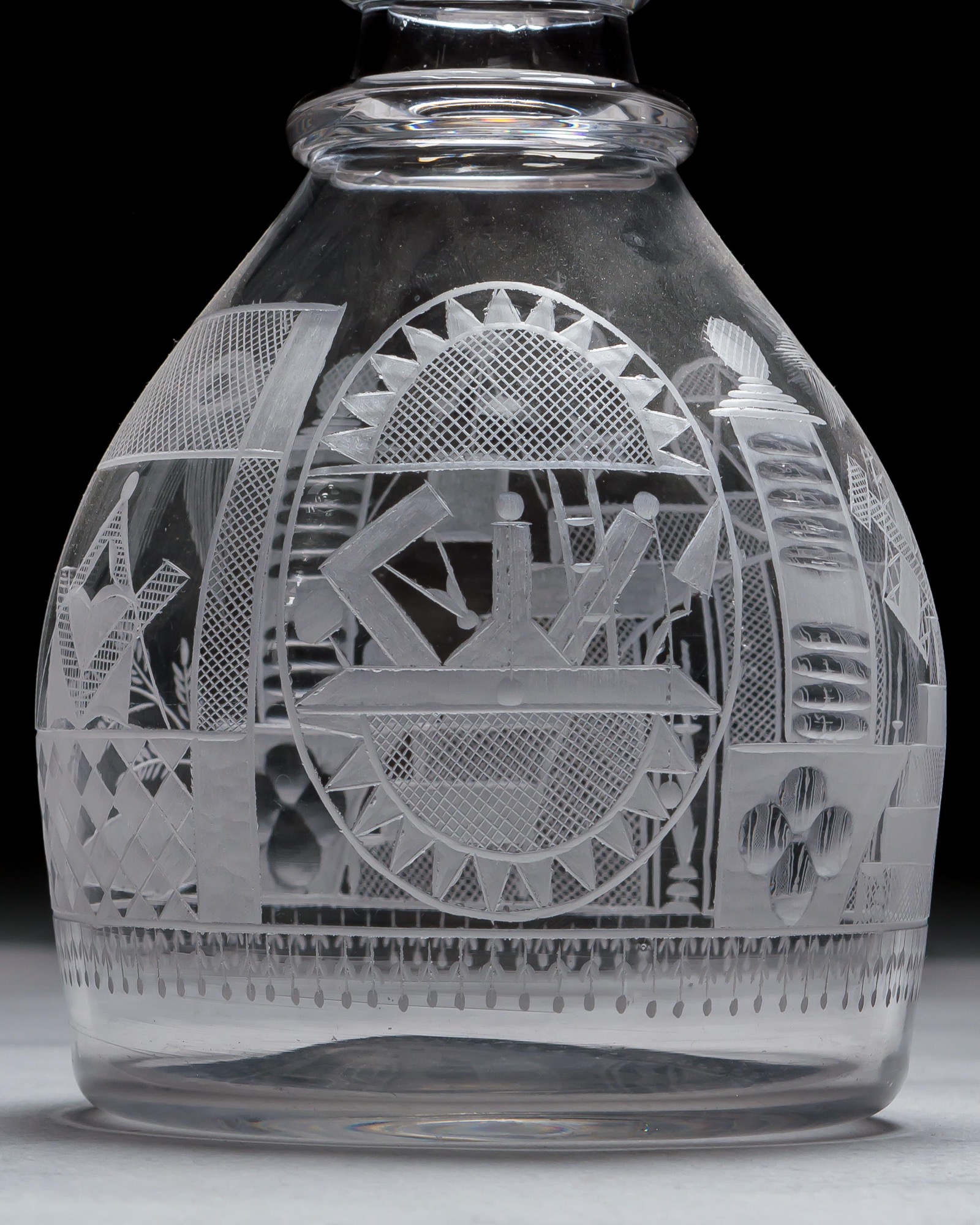 AN ENGRAVED GLASS SERVICE OF MASONIC INTEREST ALONG WITH A COLLECTION OF CORRESPONDING MASONIC REGALIA