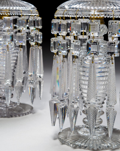A PAIR OF ELABORATELY CUT REGENCY LUSTRES