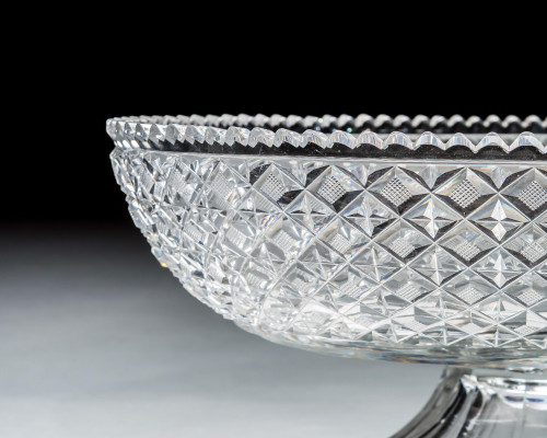 A LARGE RICHLY CUT REGENCY OVAL BOWL