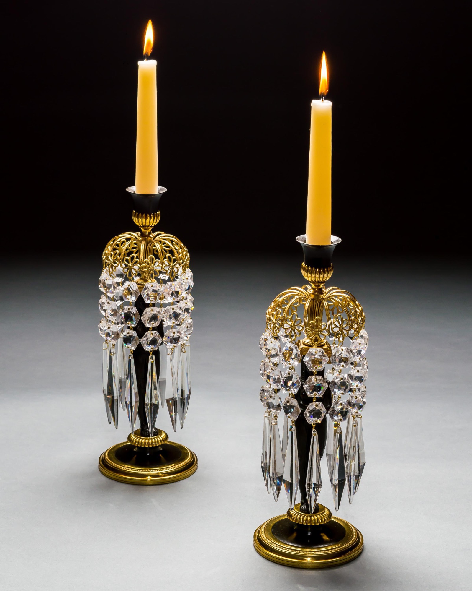 A PAIR OF REGENCY FIGURE CANDLESTICKS