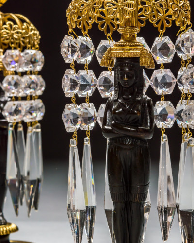 A PAIR OF REGENCY FIGURE CANDLESTICKS