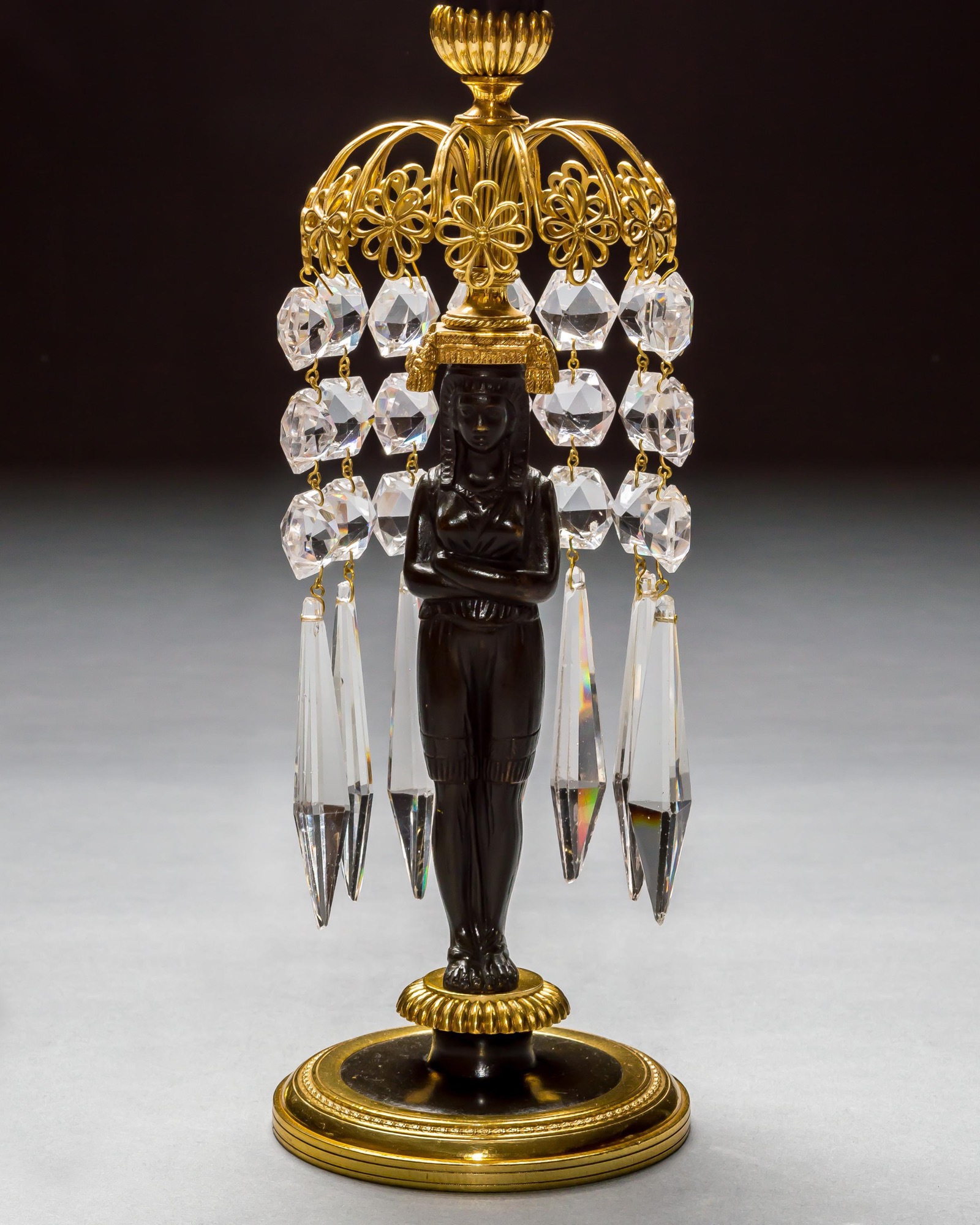 A PAIR OF REGENCY FIGURE CANDLESTICKS