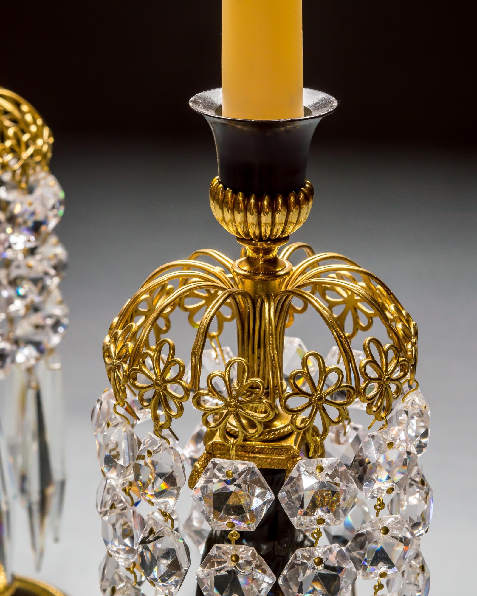 A PAIR OF REGENCY FIGURE CANDLESTICKS