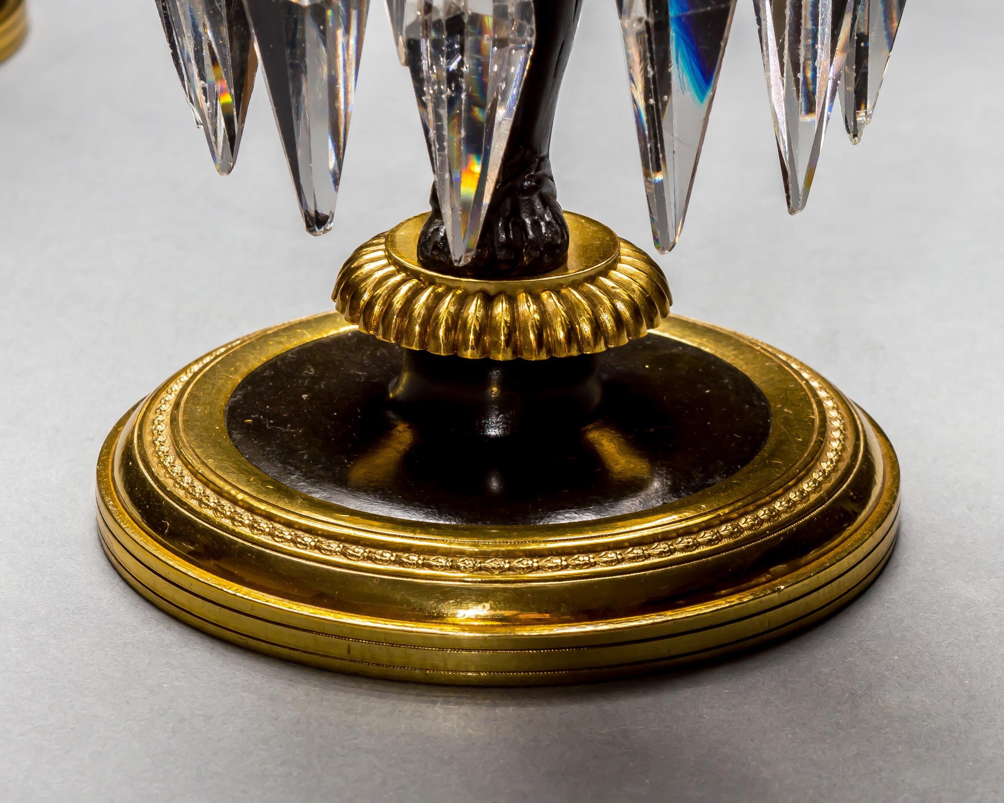 A PAIR OF REGENCY FIGURE CANDLESTICKS