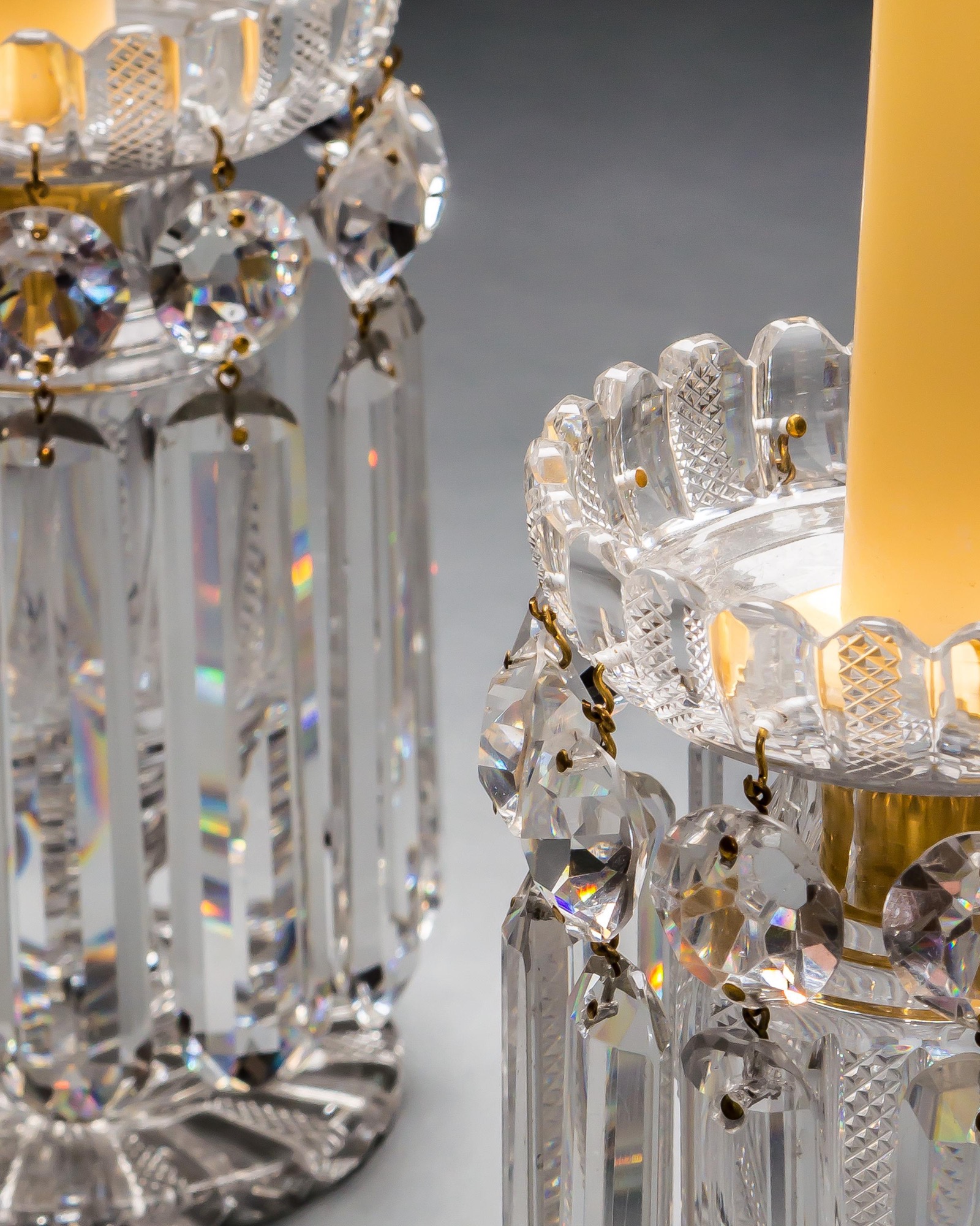 A PAIR OF RICHLY CUT REGENCY LUSTRES BY JOHN BLADES