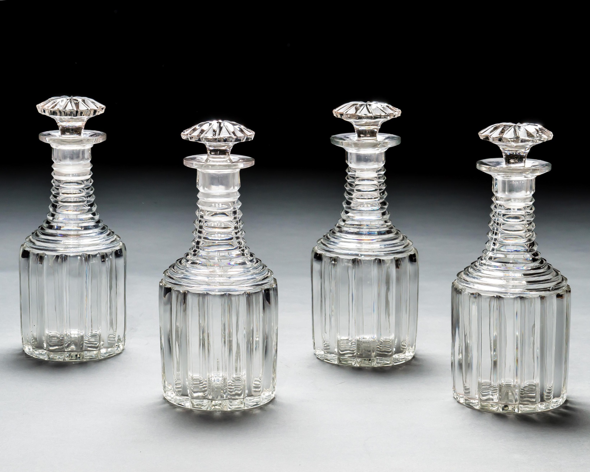 A SUITE OF WILLIAM IV DECANTERS