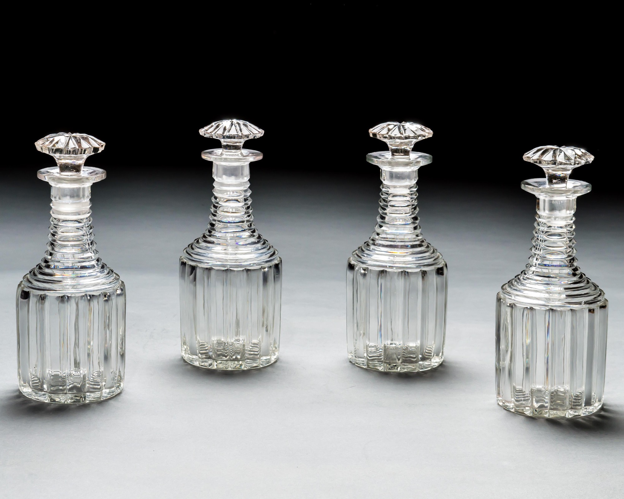A SUITE OF WILLIAM IV DECANTERS