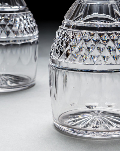 A PAIR OF CUT GLASS GEORGIAN DECANTERS