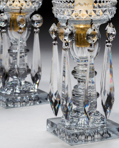 A PAIR OF REGENCY CANDLESTICKS