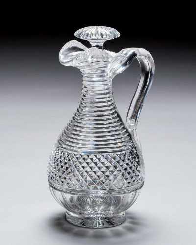 A DIAMOND & STEP CUT REGENCY CLARET JUG