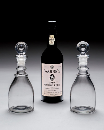 A PAIR OF TRIPLE RING GEORGIAN SPIRIT DECANTERS