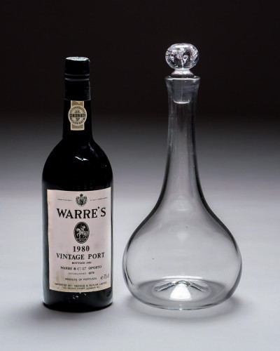 A RARE GEORGE II SHAFT & GLOBE DECANTER