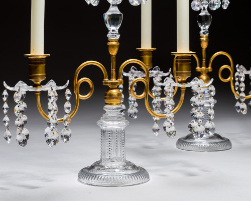 A PAIR OF ORMOLU & GLASS REGENCY CANDELABRA
