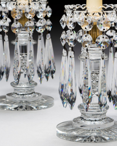 A PAIR OF DIAMOND-CUT REGENCY LUSTRES