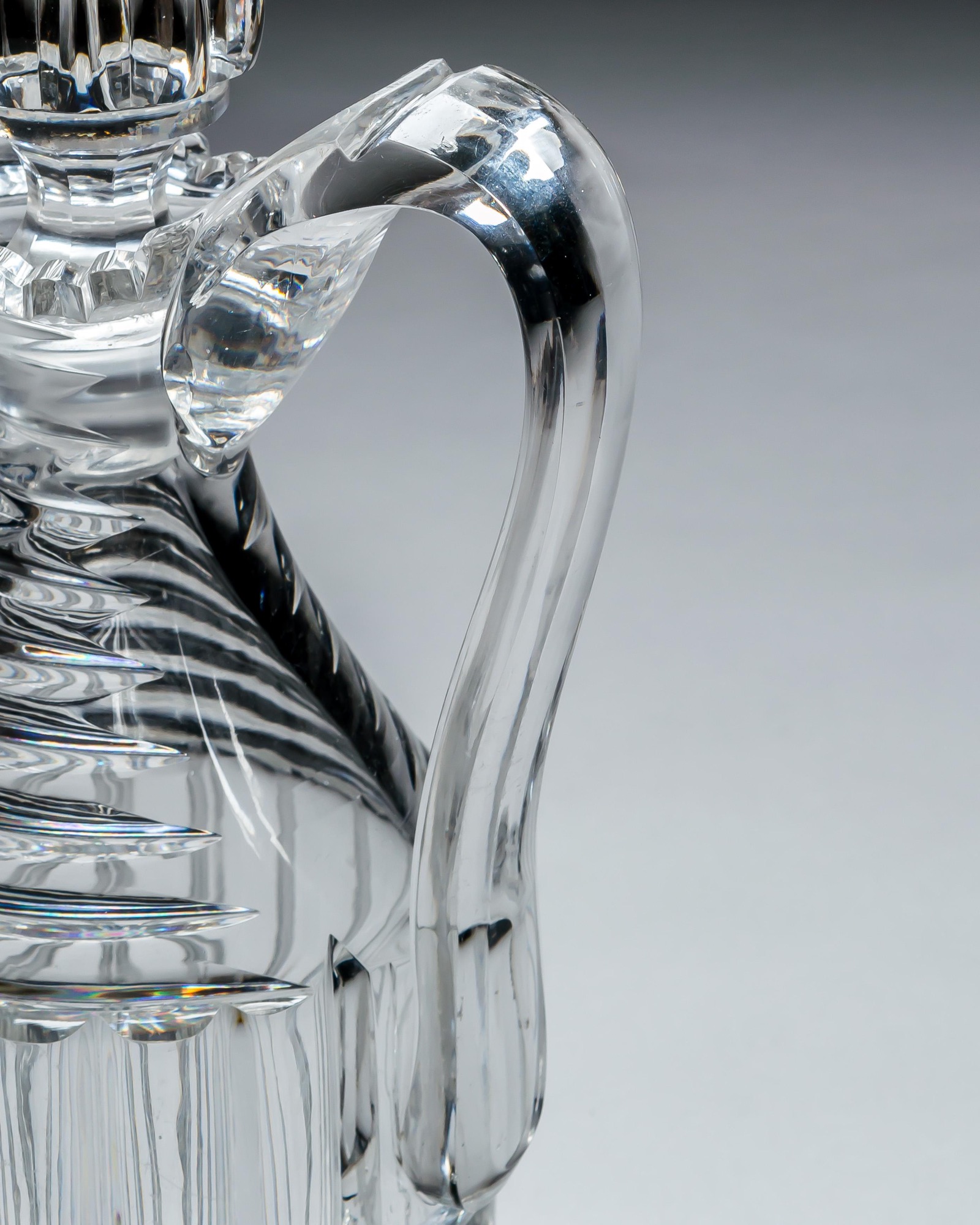 A PAIR OF PILLAR CUT REGENCY CLARET JUGS