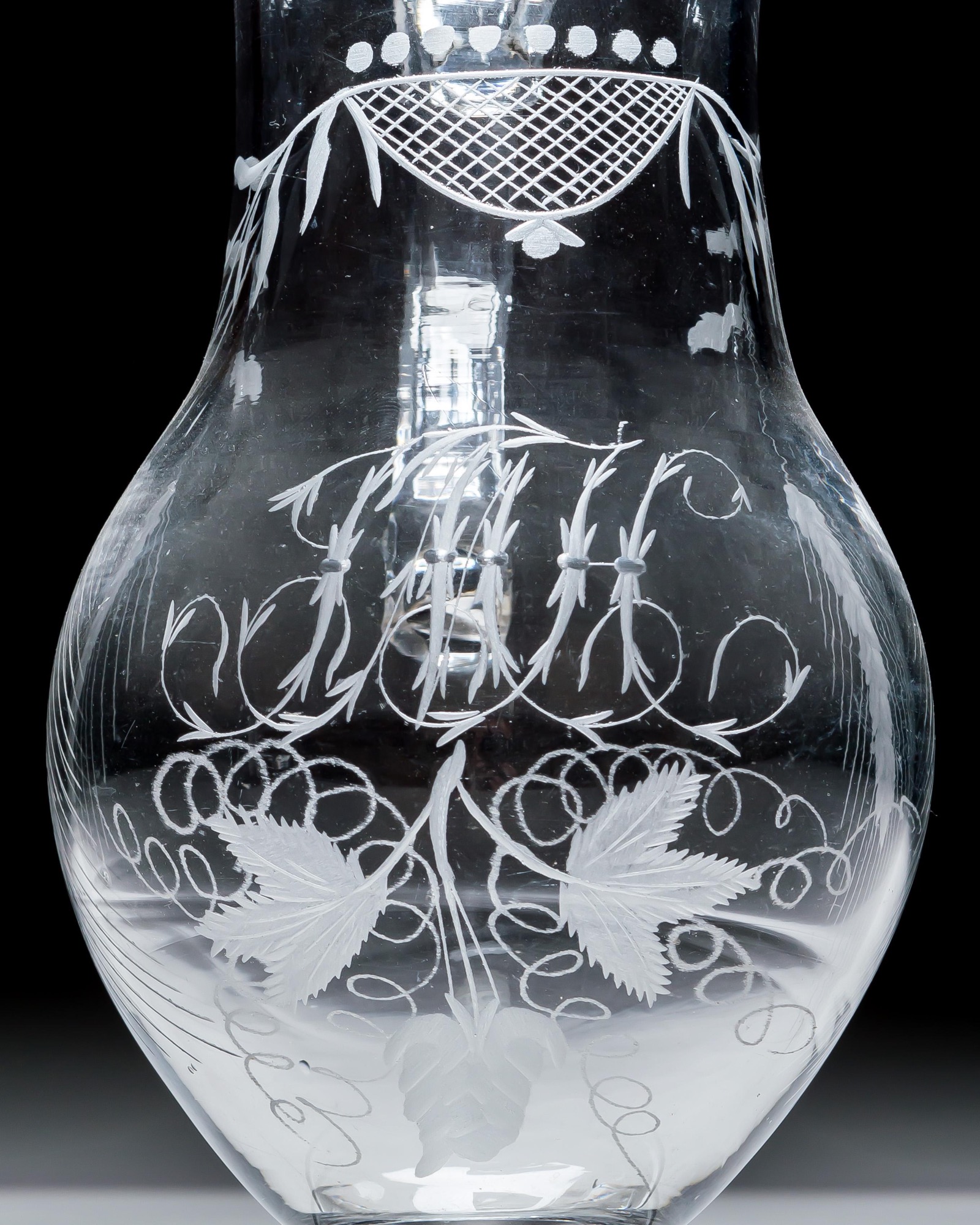 AN IRISH ENGRAVED GEORGIAN JUG