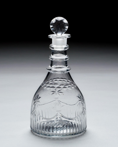 AN IRISH CUT GLASS DECANTER