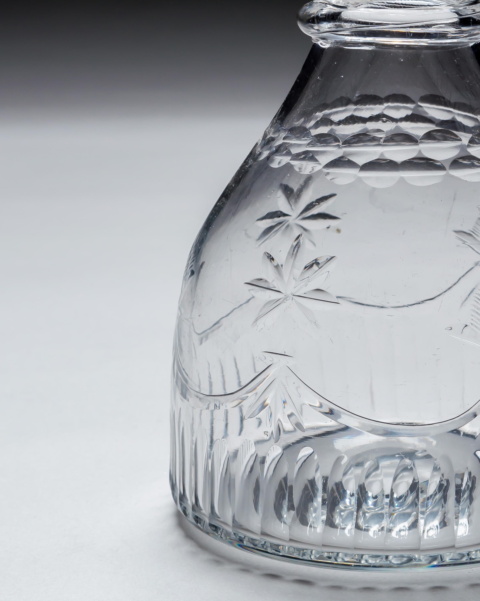 AN IRISH CUT GLASS DECANTER
