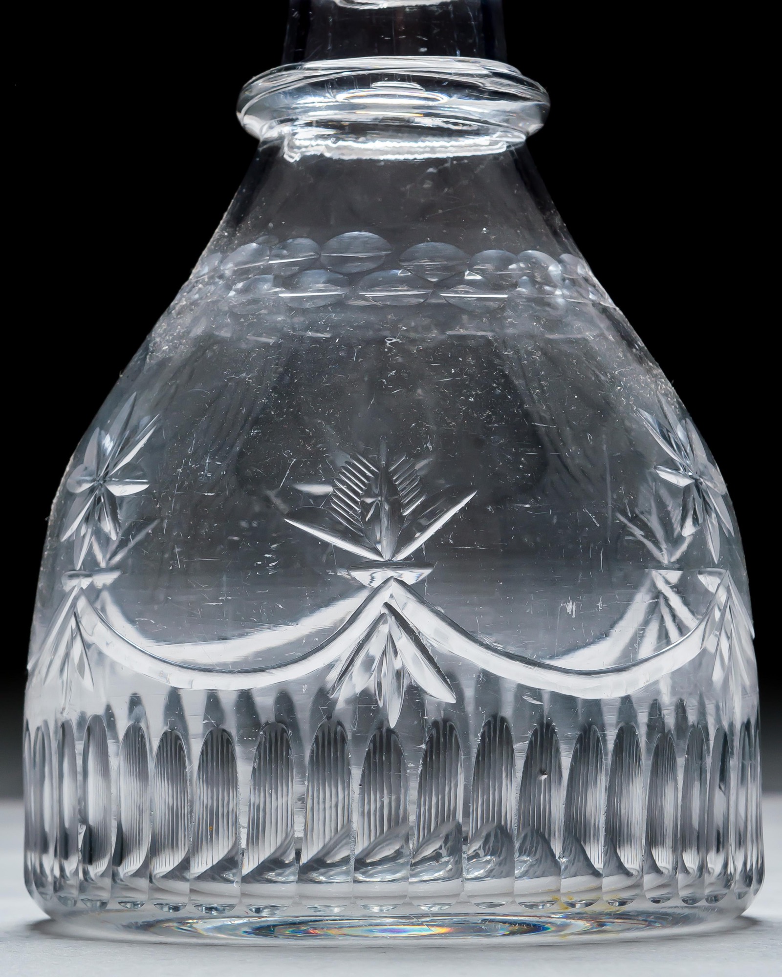 AN IRISH CUT GLASS DECANTER