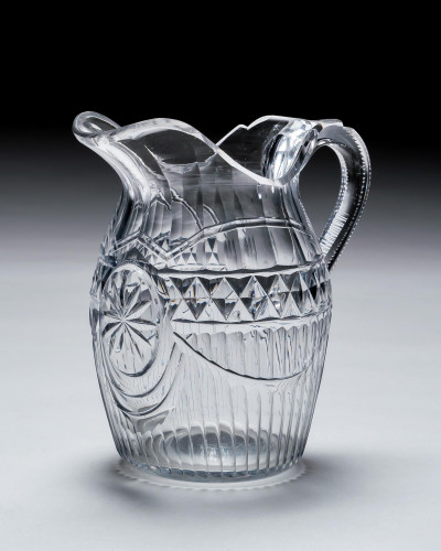 A GEORGIAN CUT GLASS WATER JUG