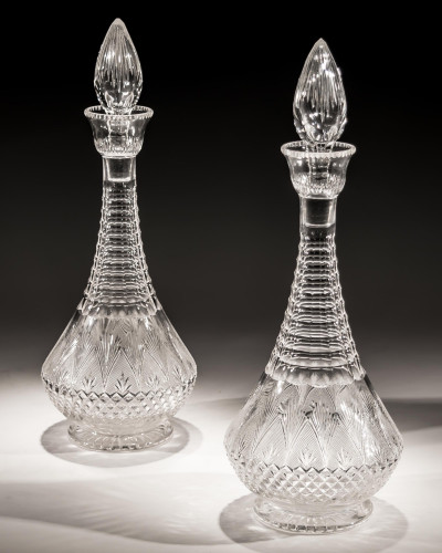 A PAIR OF ELABORATELY CUT VICTORIAN DECANTERS