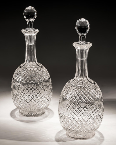 A PAIR OF CUT AND ENGRAVED VICTORIAN CRYSTAL DECANTERS