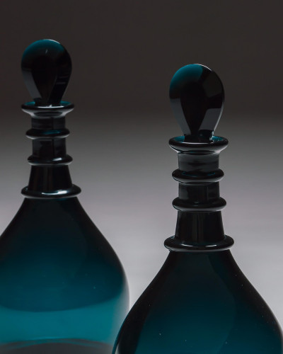 A PAIR OF TRIPLE RING GREEN DECANTERS