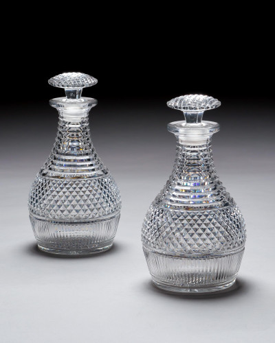 A PAIR OF REGENCY CUT GLASS DECANTERS