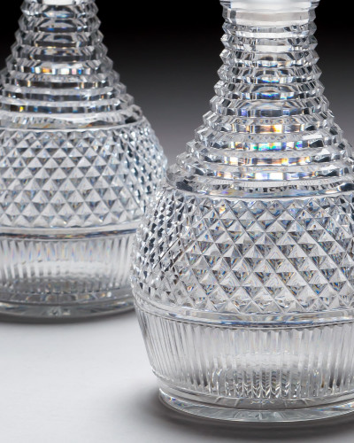A PAIR OF REGENCY CUT GLASS DECANTERS
