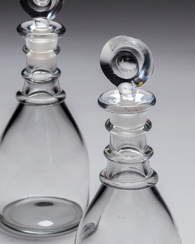 A PAIR OF TRIPLE RING GEORGIAN SPIRIT DECANTERS