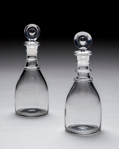 A PAIR OF TRIPLE RING GEORGIAN SPIRIT DECANTERS