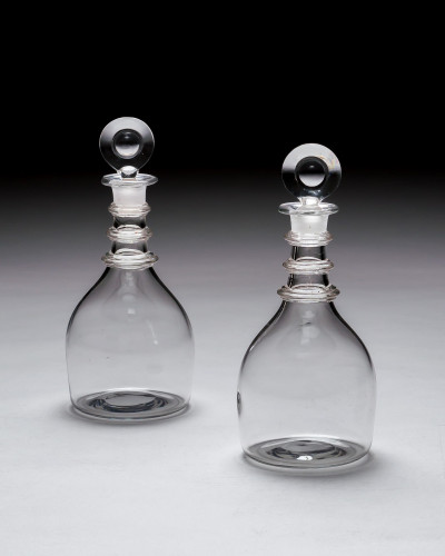 A PAIR OF TRIPLE RING DECANTERS