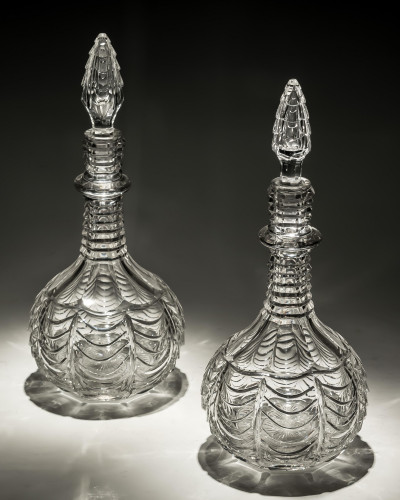 A PAIR OF SCALE CUT VICTORIAN DECANTERS