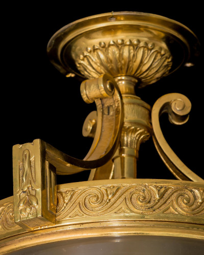 A EDWARDIAN ORMOLU MOUNTED CEILING LIGHT