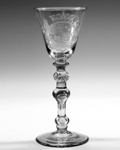A NEWCASTLE LIGHT BALUSTER FINELY ENGRAVED WITH DUTCH ROYAL COAT OF ARMS ATTRIBUTED J SANG
