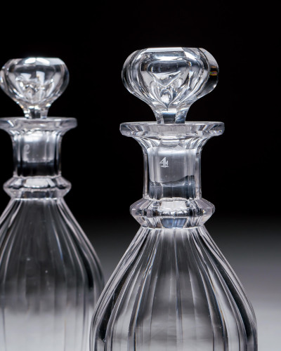 A PAIR OF SLICE CUT WILLIAM IV CLUB DECANTERS