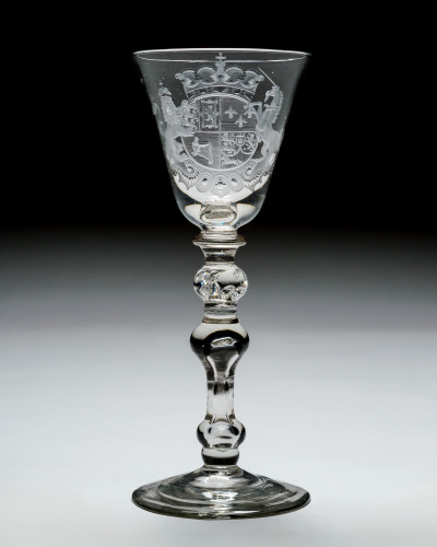A NEWCASTLE LIGHT BALUSTER FINELY ENGRAVED WITH DUTCH ROYAL COAT OF ARMS ATTRIBUTED J SANG