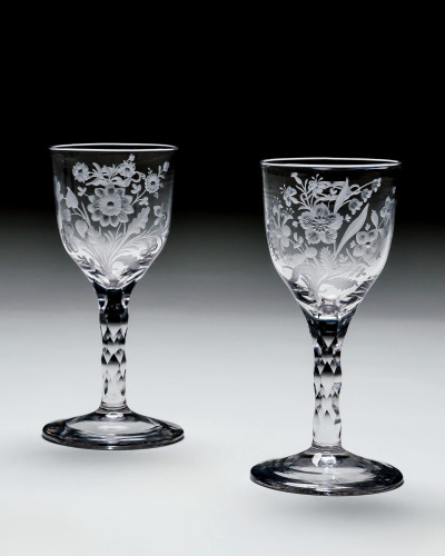 A CHARMING PAIR OF ENGRAVED FACET STEM MARRIAGE GOBLETS